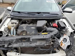 2013 Ford Edge SEL z VIN 2FMDK4JC6DBC06435, wystawiony jako Copart lot #54559065 z przebiegiem 163 407 mil mil oraz Szkoda całkowita • Salvage title. Historia ofert i sprzedaży dostępna na DreamBid. Obrazek 12.