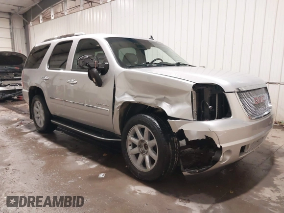 2014 GMC Yukon Denali with VIN 1GKS2EEF0ER134804, listed as a IAAI auction lot 41582709 with 142,192 mi miles. Bid and sale history available at carsss.com. Image 1.