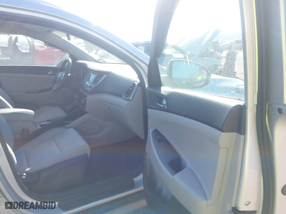 2017 Hyundai Tucson Value with VIN KM8J33A22HU457809, listed as a IAAI auction lot 41632652 with 26,154 mi miles. Bid and sale history available at carsss.com. Image 5.