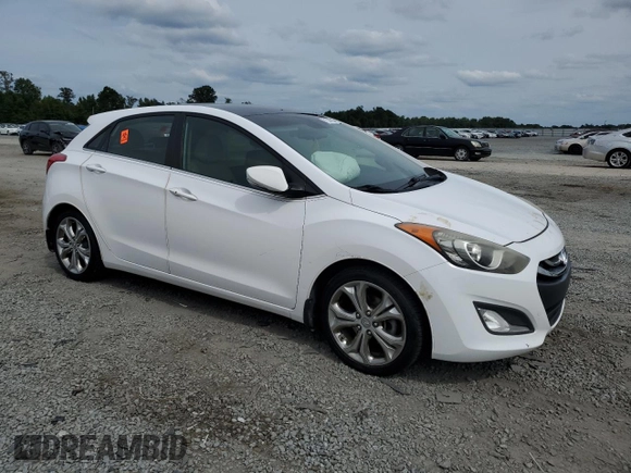 2013 Hyundai Elantra GT with VIN KMHD35LE0DU121960, listed as a Copart auction lot 71340194 with 148,280 mi miles and Salvage Title. Bid and sale history available at carsss.com. Image 4.