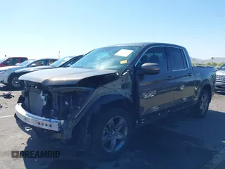 2022 Honda Ridgeline RTL with VIN 5FPYK3F58NB007618, listed as a IAAI auction lot 42258443 with 14,036 mi miles and . Bid and sale history available at DreamBid. Image 19.