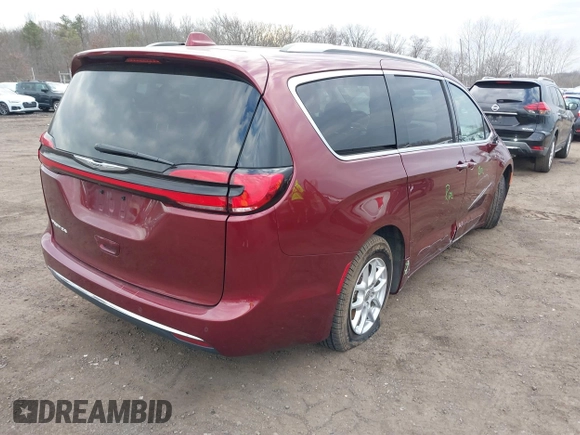 2021 Chrysler Pacifica Touring L with VIN 2C4RC1BG6MR597911, listed as a IAAI auction lot 41660729 with 72,004 mi miles and . Bid and sale history available at DreamBid. Image 4.