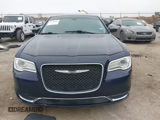 2015 Chrysler 300 Limited with VIN 2C3CCAAG5FH796498, listed as a IAAI auction lot 41520694 with 165,433 mi miles. Bid and sale history available at carsss.com. Image 12.