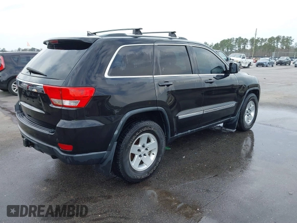 2012 Jeep Grand Cherokee Laredo with VIN 1C4RJEAG2CC259279, listed as a IAAI auction lot 41768024 with 185,161 mi miles. Bid and sale history available at carsss.com. Image 4.
