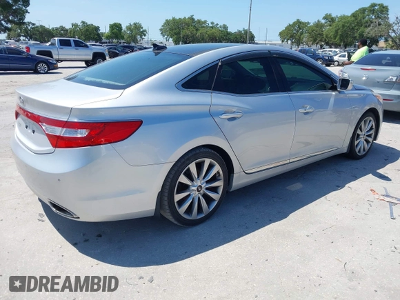 2013 Hyundai Azera with VIN KMHFH4JG6DA321882, listed as a IAAI auction lot 42351891 with 59,690 mi miles and . Bid and sale history available at DreamBid. Image 4.