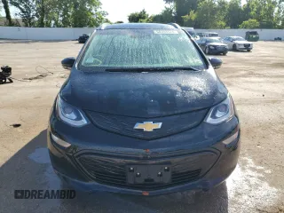 2021 Chevrolet Bolt EV Premier with VIN 1G1FZ6S04M4109942, listed as a Copart auction lot 60393574 with 46,871 mi miles and Salvage title. Bid and sale history available at DreamBid. Image 5.