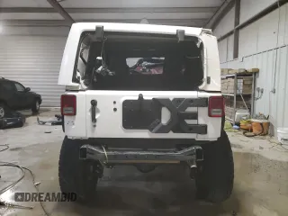 2017 Jeep Wrangler Unlimited Rubicon Recon with VIN 1C4BJWFG3HL577788, listed as a Copart auction lot 82932034 with 142,752 mi miles and Salvage title. Bid and sale history available at DreamBid. Image 6.