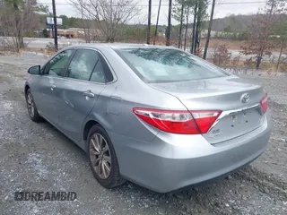 2015 Toyota Camry XLE with VIN 4T1BF1FKXFU955780, listed as a IAAI auction lot 41731667 with 210,750 mi miles and . Bid and sale history available at DreamBid. Image 3.