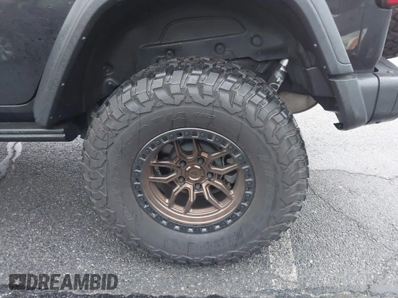 2022 Jeep Wrangler Unlimited Rubicon with VIN 1C4HJXFGXNW127064, listed as a IAAI auction lot 41491203 with 47,700 mi miles and . Bid and sale history available at DreamBid. Image 18.