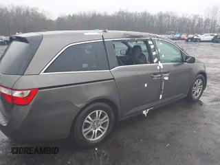 2012 Honda Odyssey EX-L with VIN 5FNRL5H64CB037689, listed as a IAAI auction lot 41857822 with 121,601 mi miles and . Bid and sale history available at carsss.com. Image 17.