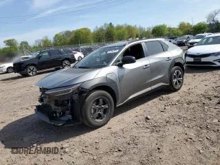 2024 Subaru Solterra Limited z VIN JTMABABA3RA048190, wystawiony jako Copart lot #54700725 z przebiegiem 7 837 mil mil oraz Szkoda całkowita • Salvage title. Historia ofert i sprzedaży dostępna na DreamBid. Obrazek 1.