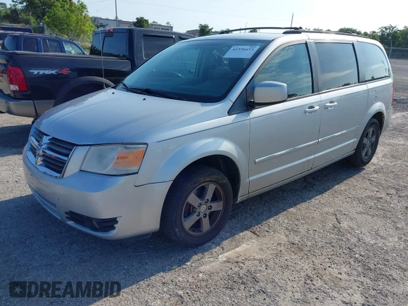 2009 Dodge Grand Caravan SXT z VIN 2D8HN54189R671683, wystawiony jako IAAI lot #42350455 z przebiegiem 220 306 mil mil oraz . Historia ofert i sprzedaży dostępna na DreamBid. Obrazek 2.