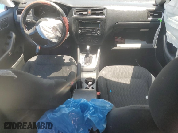 2014 Volkswagen Jetta S z VIN 3VW2K7AJ2EM413722, wystawiony jako Copart lot #61877505 z przebiegiem Nie podano mil oraz Szkoda całkowita • Salvage title. Historia ofert i sprzedaży dostępna na DreamBid. Obrazek 8.