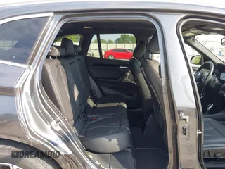 2020 BMW X1 xDrive28i with VIN WBXJG9C08L5R71788, listed as a IAAI auction lot 42604792 with 46,489 mi miles and . Bid and sale history available at DreamBid. Image 8.