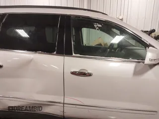 2017 Chevrolet Traverse Premier with VIN 1GNKVJKD9HJ340891, listed as a IAAI auction lot 41601595 with 96,647 mi miles and . Bid and sale history available at DreamBid. Image 13.