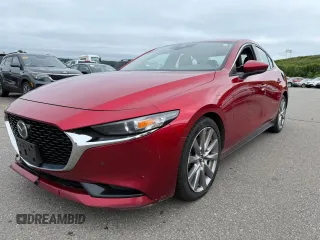 2019 Mazda 3 S Carbon Edition with VIN JM1BPBCM6K1111888, listed as a Copart auction lot 65150505 with 194,637 mi miles and Clean title. Bid and sale history available at DreamBid. Image 1.