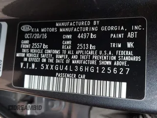 2017 Kia Optima EX with VIN 5XXGU4L36HG125627, listed as a IAAI auction lot 41949580 with 123,548 mi miles. Bid and sale history available at carsss.com. Image 9.