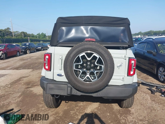 2022 Ford Bronco with VIN 1FMEE5DP7NLA78997, listed as a IAAI auction lot 42462203 with 20,253 mi miles and . Bid and sale history available at DreamBid. Image 16.