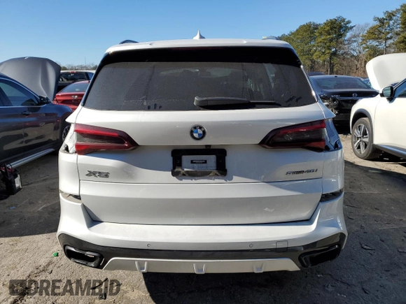 2022 BMW X5 sDrive40i with VIN 5UXCR4C01N9J97204, listed as a Copart auction lot 88157405 with 34,788 mi miles and Salvage Title. Bid and sale history available at carsss.com. Image 6.