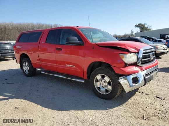 2012 Toyota Tundra 4WD Truck with VIN 5TFUM5F11CX030266, listed as a Copart auction lot 48392165 with 192,794 mi miles and Salvage Title. Bid and sale history available at carsss.com. Image 4.