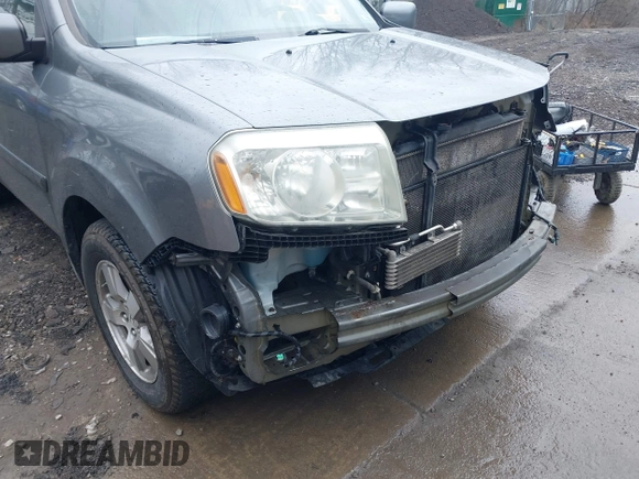 2009 Honda Pilot EX-L with VIN 5FNYF48669B033858, listed as a IAAI auction lot 41918525 with 161,605 mi miles and . Bid and sale history available at carsss.com. Image 15.