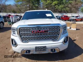 2020 GMC Sierra 1500 Denali z VIN 1GTU9FEL7LZ152659, wystawiony jako IAAI lot #41662492 z przebiegiem 101 222 mil mil oraz . Historia ofert i sprzedaży dostępna na DreamBid. Obrazek 12.
