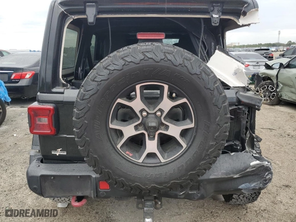 2019 Jeep Wrangler Unlimited Rubicon with VIN 1C4HJXFN6KW665805, listed as a Copart auction lot 45424005 with 141,007 mi miles and Salvage Title. Bid and sale history available at carsss.com. Image 6.