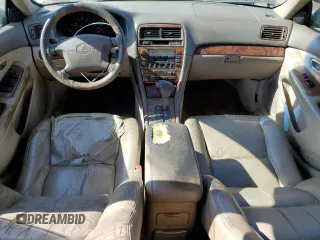 2000 Lexus ES 300 with VIN JT8BF28GXY5091263, listed as a Copart auction lot 61767595 with 250,041 mi miles and Salvage title. Bid and sale history available at DreamBid. Image 8.