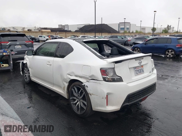 2014 Scion tC z VIN JTKJF5C77E3080128, wystawiony jako IAAI lot #42174898 z przebiegiem Nie podano mil oraz . Historia ofert i sprzedaży dostępna na DreamBid. Obrazek 14.