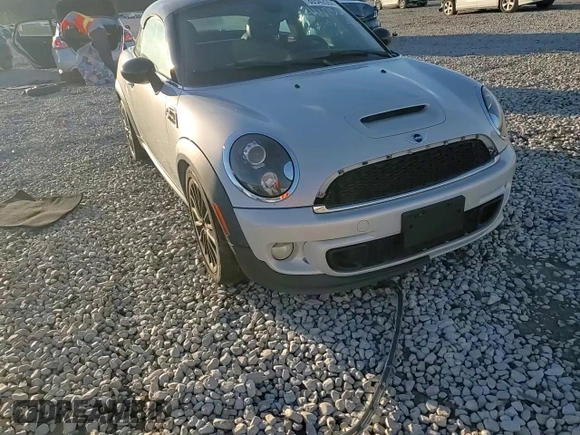2013 MINI Coupe S z VIN WMWSX3C56DT466756, wystawiony jako Copart lot #80542054 z przebiegiem 95 135 mil mil oraz Szkoda całkowita • Salvage title. Historia ofert i sprzedaży dostępna na DreamBid. Obrazek 11.