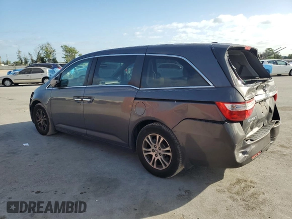 2012 Honda Odyssey EX-L with VIN 5FNRL5H66CB146350, listed as a Copart auction lot 55428555 with 171,207 mi miles and Salvage Title. Bid and sale history available at DreamBid. Image 2.