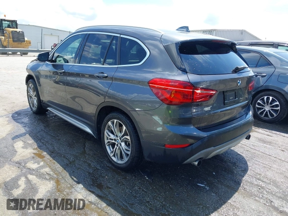 2017 BMW X1 xDrive28i with VIN WBXHT3Z38H4A55086, listed as a IAAI auction lot 42459276 with 101,907 mi miles and . Bid and sale history available at DreamBid. Image 3.