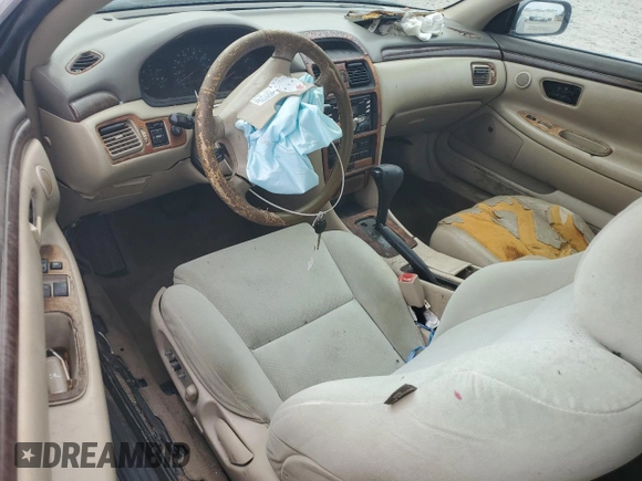 1999 Toyota Solara SE with VIN 2T1CF22PXXC164874, listed as a Copart auction lot 43596255 with Not Provided miles and Salvage Title. Bid and sale history available at DreamBid. Image 8.