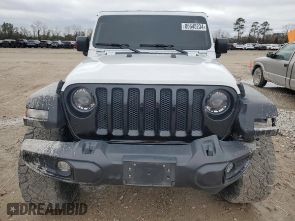 2023 Jeep Wrangler Sport S with VIN 1C4HJXDN3PW522353, listed as a Copart auction lot 86645234 with 17,562 mi miles and Salvage Title. Bid and sale history available at DreamBid. Image 5.
