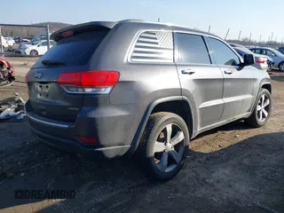 2014 Jeep Grand Cherokee Limited with VIN 1C4RJEBGXEC499052, listed as a IAAI auction lot 41665838 with 160,473 mi miles. Bid and sale history available at carsss.com. Image 4.