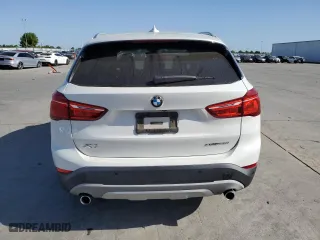 2019 BMW X1 xDrive28i with VIN WBXHT3C53K5L35670, listed as a Copart auction lot 53493245 with 14,201 mi miles and Salvage Title. Bid and sale history available at carsss.com. Image 6.