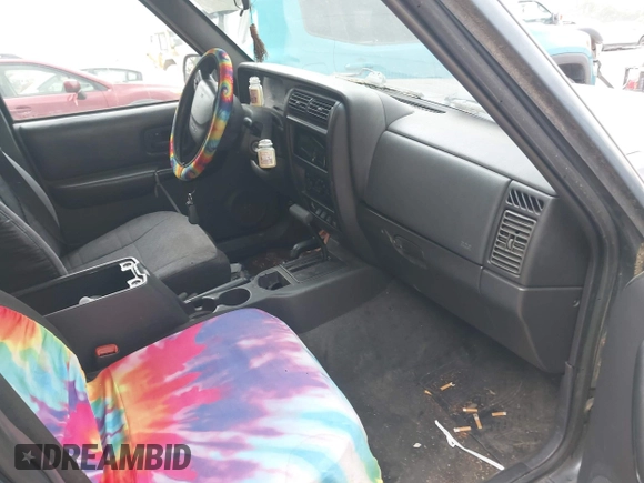 2001 Jeep Cherokee Sport with VIN 1J4FF48S91L571731, listed as a IAAI auction lot 42576272 with 181,688 mi miles and . Bid and sale history available at DreamBid. Image 5.