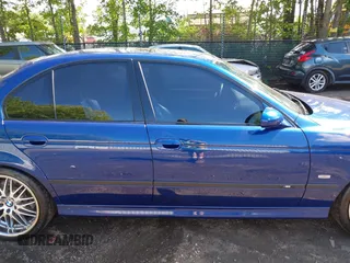 2002 BMW M5 z VIN WBSDE93452BZ99916, wystawiony jako IAAI lot #42346645 z przebiegiem 90 876 mil mil oraz . Historia ofert i sprzedaży dostępna na DreamBid. Obrazek 13.