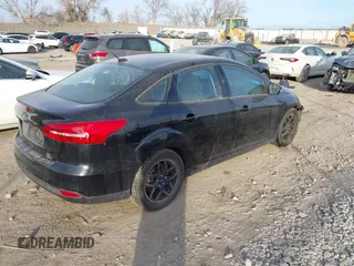 2016 Ford Focus SE z VIN 1FADP3FEXGL310270, wystawiony jako IAAI lot #40956503 z przebiegiem 156 812 mil mil oraz . Historia ofert i sprzedaży dostępna na DreamBid. Obrazek 4.