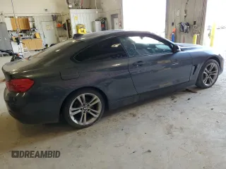 2014 BMW 4 Series 428i xDrive with VIN WBA3N5C59EF716268, listed as a Copart auction lot 52715315 with 140,469 mi miles and Clean Title. Bid and sale history available at carsss.com. Image 3.