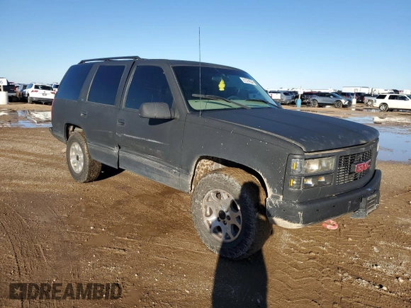 1997 GMC Yukon with VIN 1GKEK13R0VJ710179, listed as a Copart auction lot 81374234 with 186,257 mi miles and Salvage Title. Bid and sale history available at carsss.com. Image 4.