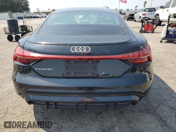 2023 Audi e-tron GT Prestige z VIN WAUDJBFWXP7003055, wystawiony jako Copart lot #71028874 z przebiegiem 7107 mil mil oraz Szkody całkowita. Historia ofert i sprzedaży dostępna na DreamBid. Obrazek 6.