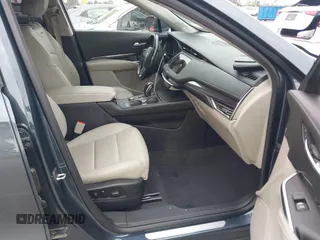 2019 Cadillac XT4 AWD Luxury with VIN 1GYFZBR41KF160352, listed as a IAAI auction lot 42047477 with 58,850 mi miles and . Bid and sale history available at DreamBid. Image 5.