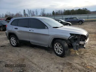 2014 Jeep Cherokee Sport with VIN 1C4PJLAB1EW123520, listed as a Copart auction lot 47265765 with 158,934 mi miles and Salvage Title. Bid and sale history available at DreamBid. Image 4.