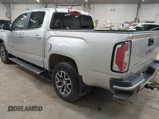 2015 GMC Canyon 4WD SLE z VIN 1GTG6BE39F1252926, wystawiony jako IAAI lot #42128396 z przebiegiem 113 139 mil mil oraz . Historia ofert i sprzedaży dostępna na DreamBid. Obrazek 3.