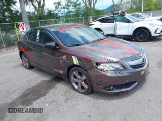 2013 Acura ILX Technology with VIN 19VDE1F70DE002429, listed as a IAAI auction lot 41921425 with 180,579 mi miles and . Bid and sale history available at DreamBid. Image 1.