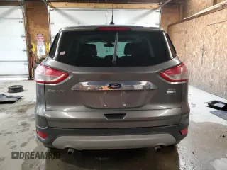 2013 Ford Escape SEL with VIN 1FMCU9HX5DUB97779, listed as a Copart auction lot 52407545 with 145,302 mi miles and Salvage Title. Bid and sale history available at carsss.com. Image 6.