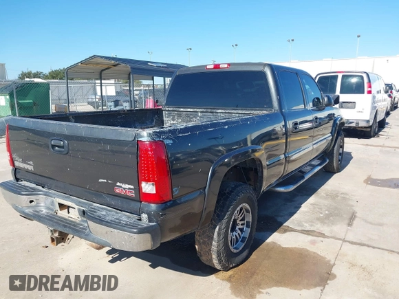 2003 GMC Sierra 1500HD SLE z VIN 1GTGC13U53F203980, wystawiony jako IAAI lot #41206524 z przebiegiem 309 414 mil mil oraz . Historia ofert i sprzedaży dostępna na DreamBid. Obrazek 4.