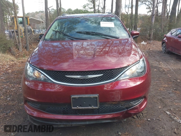 2021 Chrysler Voyager LXi with VIN 2C4RC1DG1MR556020, listed as a IAAI auction lot 41044760 with 6,286 mi miles and . Bid and sale history available at DreamBid. Image 12.