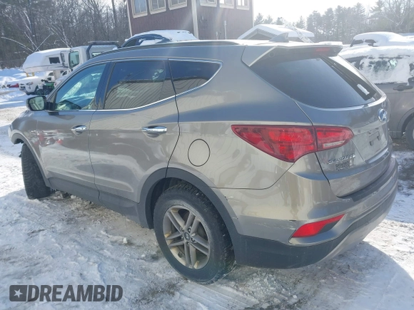 2017 Hyundai Santa Fe 2.4L with VIN 5NMZUDLB4HH034437, listed as a IAAI auction lot 41565545 with 96,640 mi miles and . Bid and sale history available at DreamBid. Image 3.